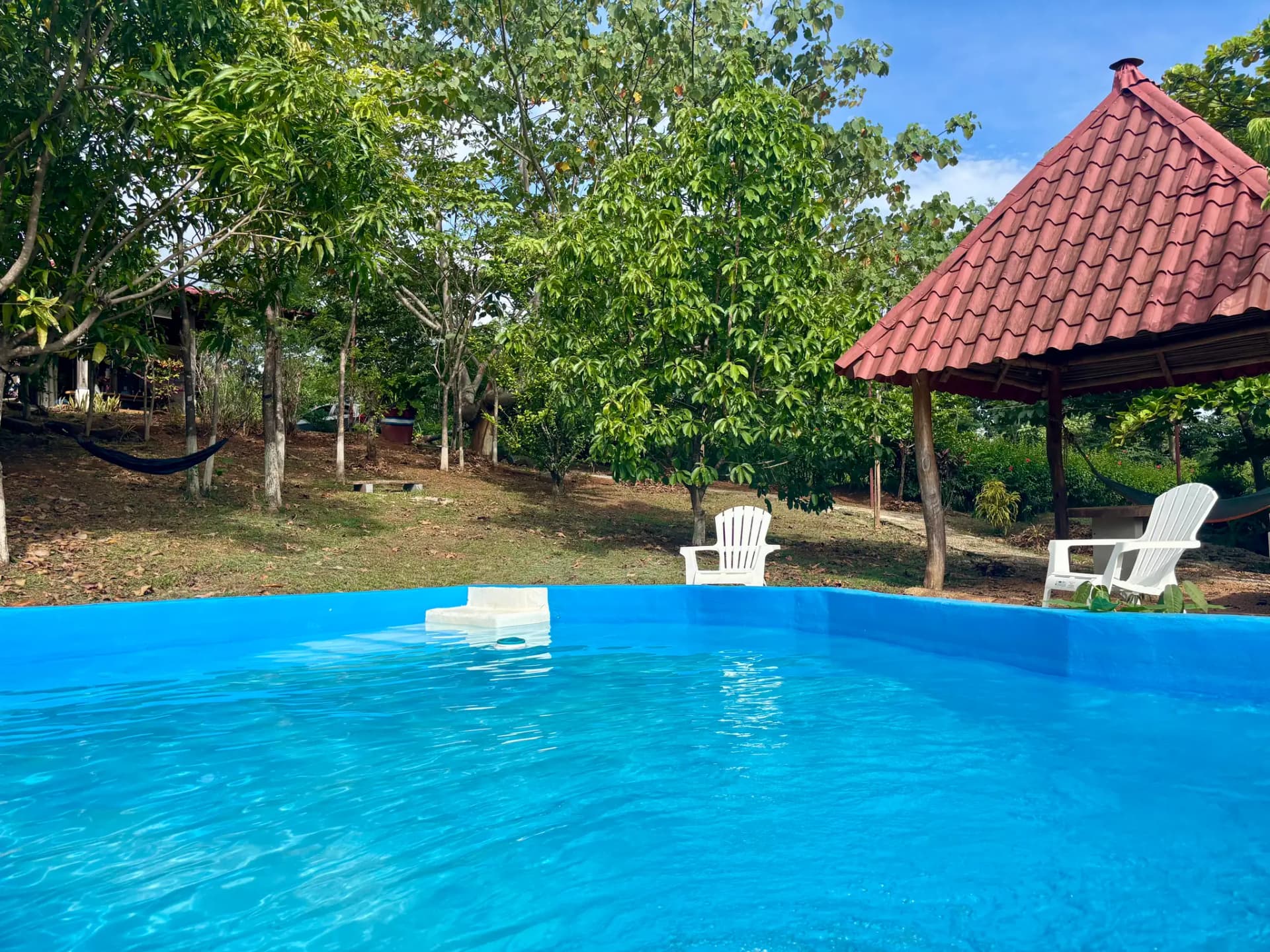 Pura Noche's pool and rancho in daylight